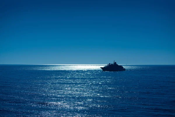 Sunset sunrise boat reaching Ibiza port — Stock Photo, Image