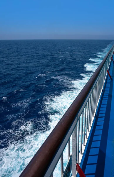 Ferry cruise railing in a blue sea ocean Royalty Free Stock Images