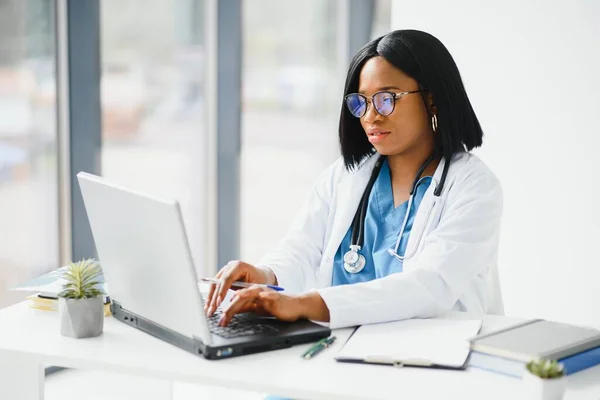 beautiful female african american medical nurse with stethoscope