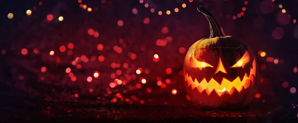Halloween abóboras brilhando horror fundo de férias — Fotografia de Stock