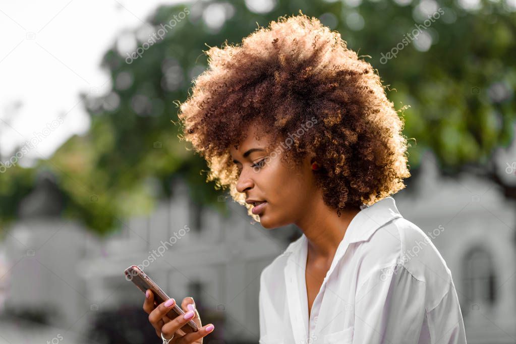 Outdoor portrait of a Young black African American young woman t