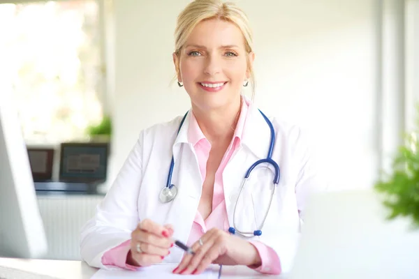 Smiling Senior Female Doctor Working Light Office — Stock Photo, Image