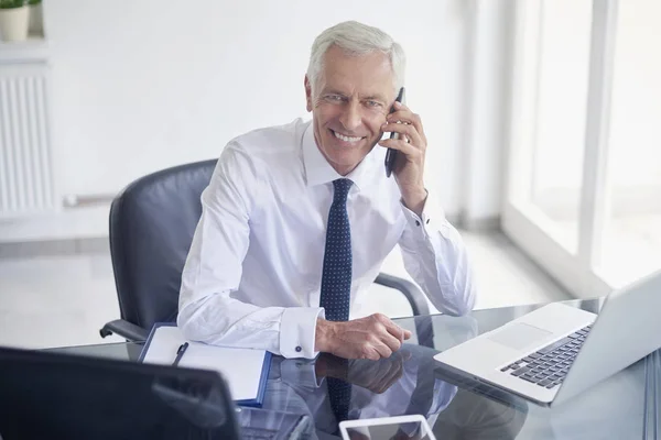 Executive Senior Businessman Talking Smartphone While Working Laptop Office — Stock Photo, Image