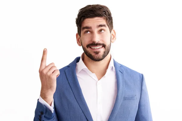 Studio Shot Smiling Young Man Suit Pointing Upwards His Finger — Stock Photo, Image