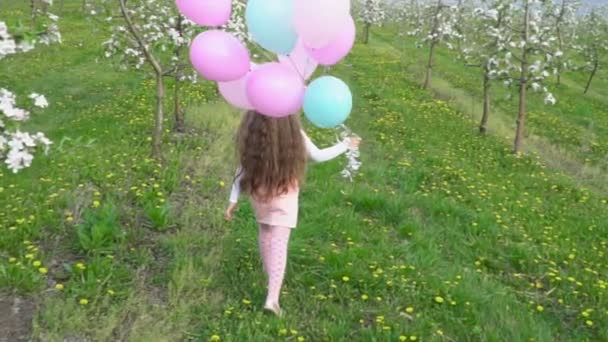 Little girl with balloons — Stock Video