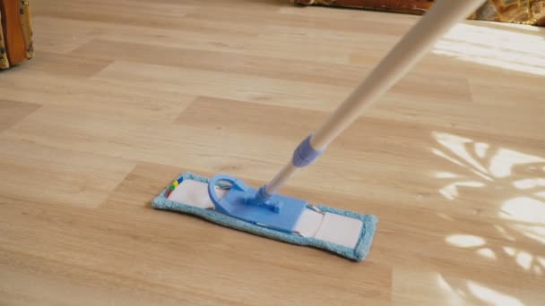 Cleaning the floor with a mop — Stock Video