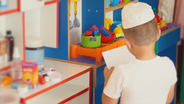 Boy playing doctor — Stock Video