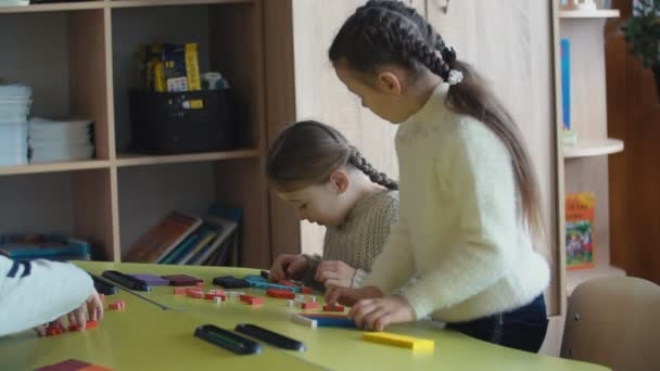 Girls playing with a constructor — Stock Video