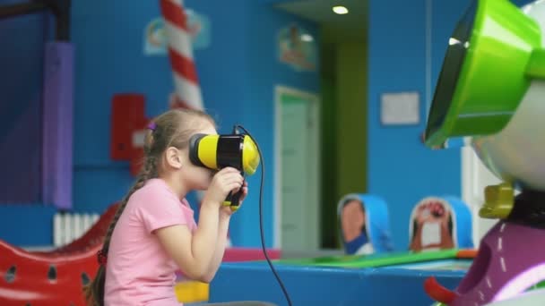 Girl plays with virtual glasses — Stock Video