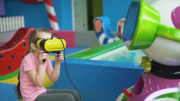 Girl plays with virtual glasses — Stock Video