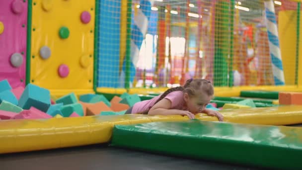 Girl playing with soft cubes — Stock Video