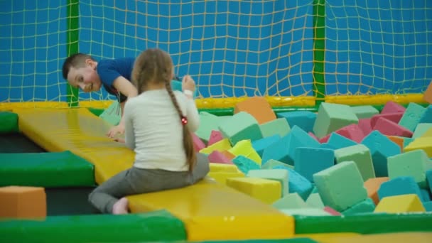 Children play with soft cubes — Stock Video