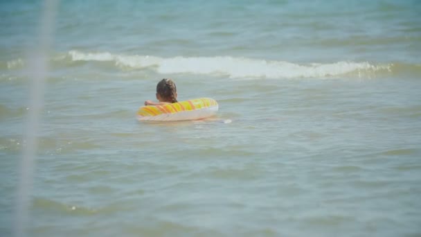 Girl swimming in the sea — Stock Video