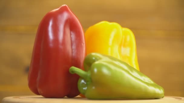 Red, yellow and green peppers — Stock Video