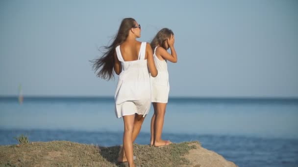 Mother with daughter in white dresses — Stock Video