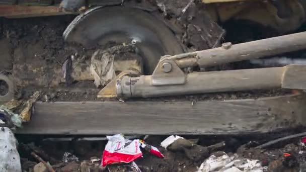 Crawler bulldozer shovel pushes trash — Stock Video