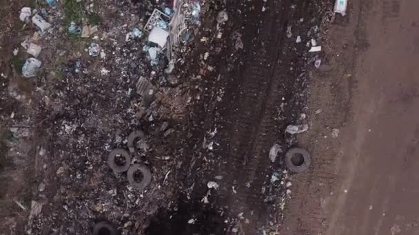 Bulldozer piling up garbage — Stock Video