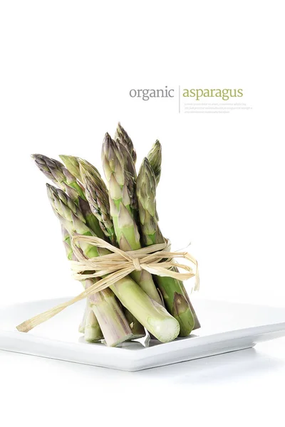 Stacked Freshly Cut Asparagus Tips Tied Raffia Shot White Background — Stock Photo, Image