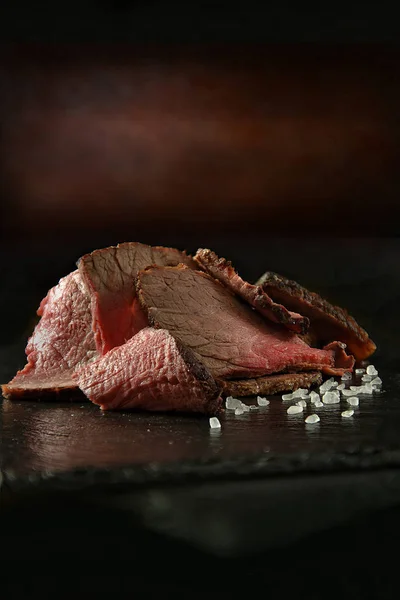 Slices Prime Topside Roast Beef Stacked Rock Salt Black Oiled — Stock Photo, Image