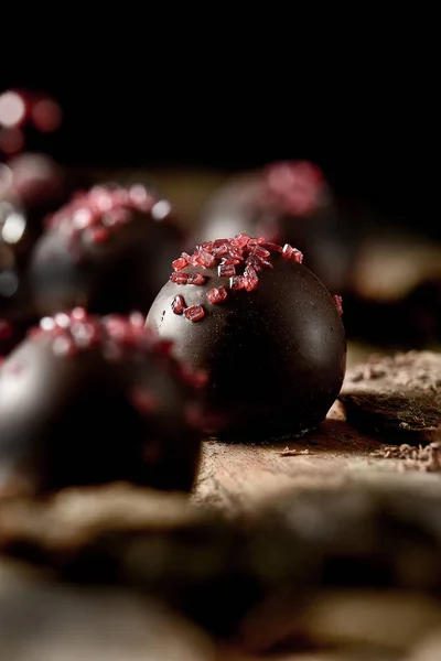 Dark Autumnal Rustic Styled Dark Belgium Liqueur Chocolates Gelatin Chip — Stock Photo, Image