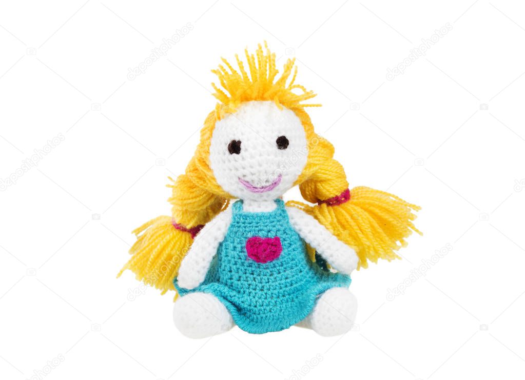 Crochet doll. Handmade cute knitting doll. Amigurumi toy.