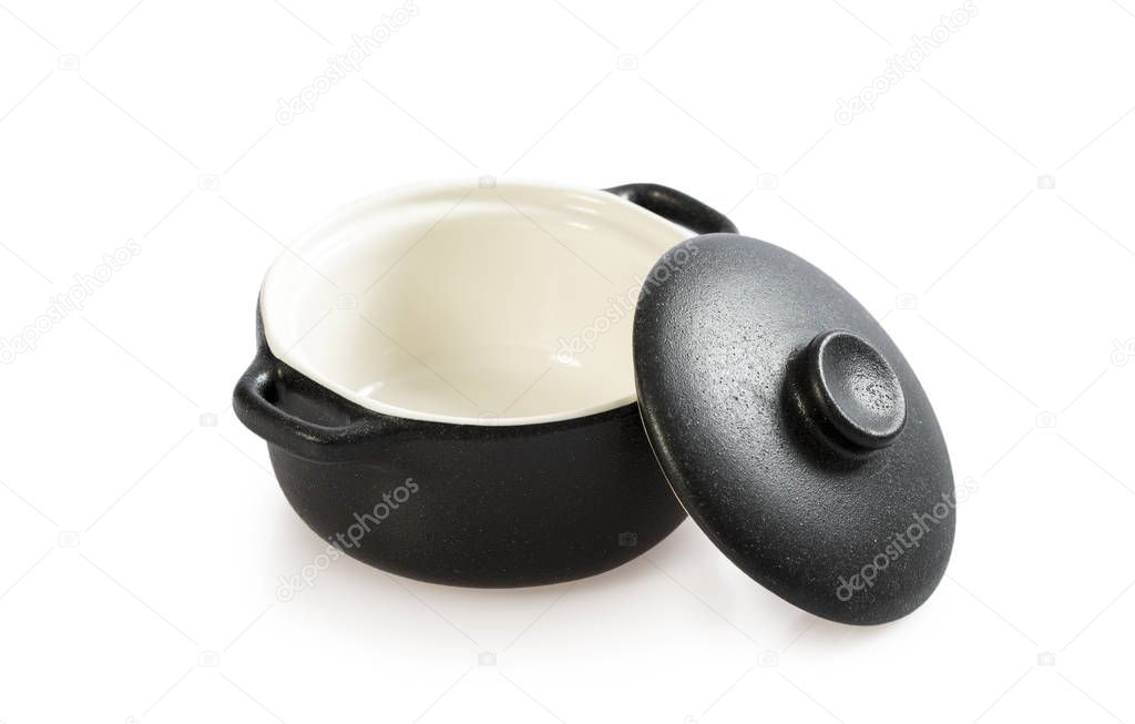 Cooking pot isolated on white. Black colour outside and white inside. Baking pot.