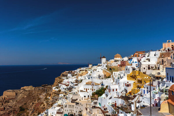 Santorini, Greece. Picturesque view of traditional Cycladic Oia Santorini houses on the cliff