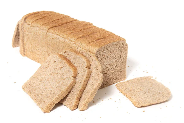Traditional rectangular loaf of bread on white background.