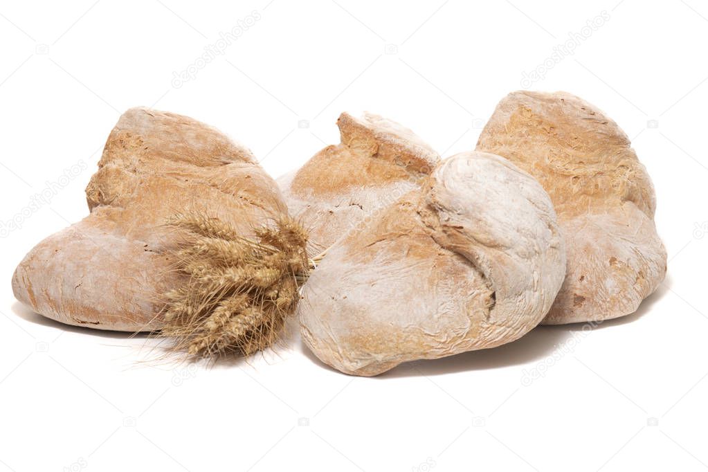 Traditional large loaf of bread of Portugal isolated on a white background.