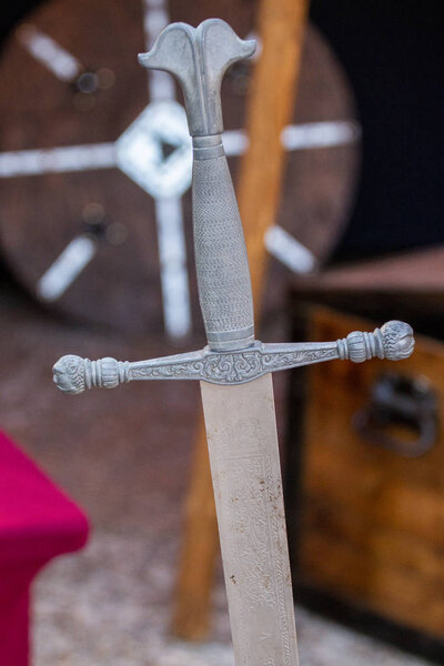 Close up view of a Medieval sword detail at display on a fair.