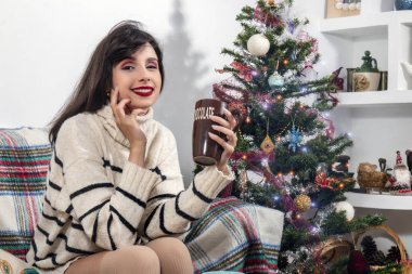 Young girl on sofa at christmas