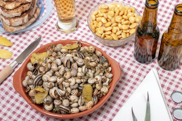 Traditional dish of cooked snails — Stock Photo, Image
