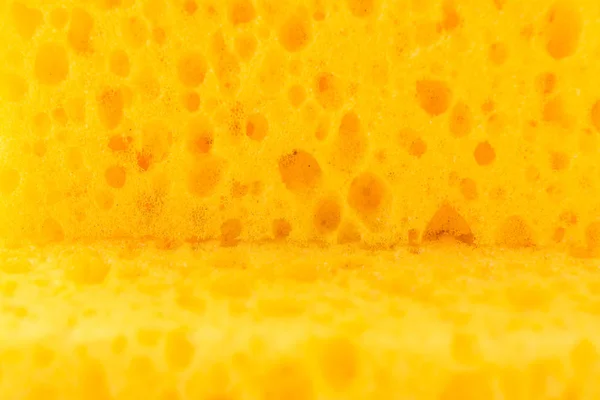 Texture Yellow Foam Rubber Synthetic Sponge Large Pores Selective Focus — Stock Photo, Image