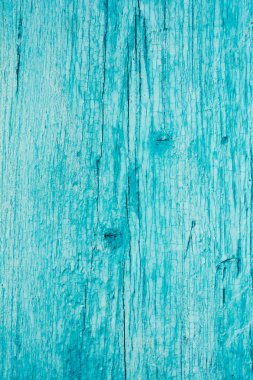 çatlaklar, eski ağacının bir karanlık doku boyalı soyulması mavi boya, yakın çekim arka plan ile ahşap yüzey
