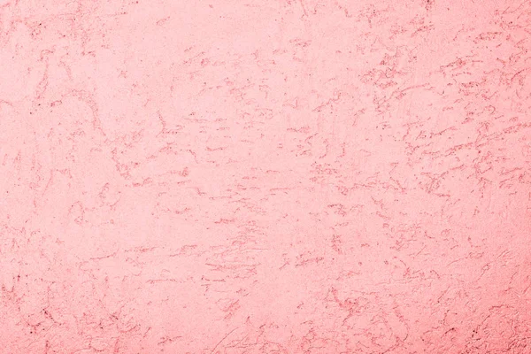 The pink texture of the surface of the wall covered with decorative plaster of the woodworm type, close-up architecture abstract background — Stock Image Pink Texture Surface Wall Covered Decorative Plaster Woodworm Type Close Stock Picture