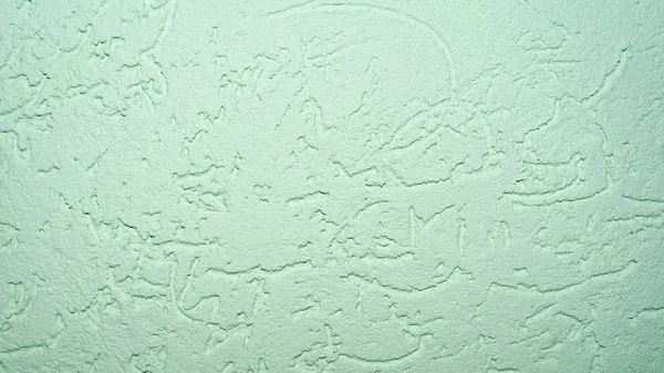 木食い虫型 クローズ アップ建築抽象的な背景の装飾的なプラスターで覆われた壁の表面の緑色のテクスチャ — ストック写真