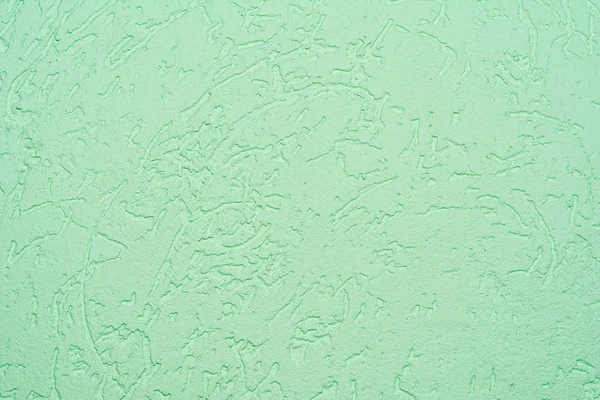 木食い虫型 クローズ アップ建築抽象的な背景の装飾的なプラスターで覆われた壁の表面の緑色のテクスチャ — ストック写真