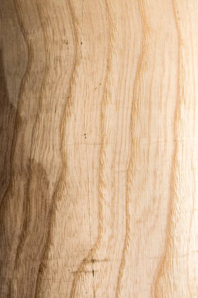 embossed wood texture with wavy lines and wood fibers, volume effect, close-up abstraction background