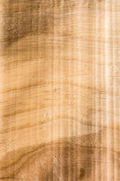 embossed wood texture with wavy lines and wood fibers, volume effect, close-up abstraction background