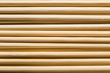 Yuvarlak ahşap arka plan yapışır. Duvar desen. Yuvarlak Ahşap sopa duvar desen detayını yakın çekim