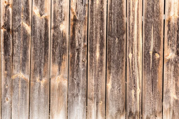 Painéis antigos verticais intemperizados, textura de painéis de madeira antigos escuros, fundo de abstração de decoração — Fotografia de Stock
