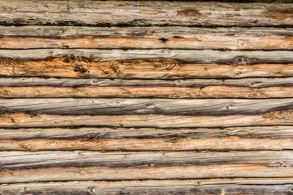 Pared de madera vieja, textura de troncos de madera antiguos, fondo de abstracción de la decoración de cerca —  Fotos de Stock