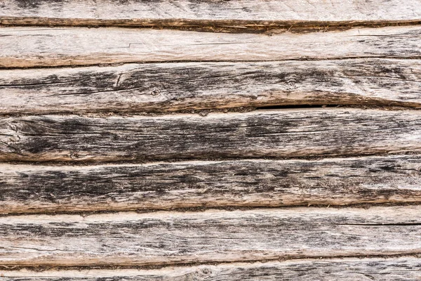 Pared de madera vieja, textura de troncos de madera antiguos, fondo de abstracción de la decoración de cerca — Foto de Stock