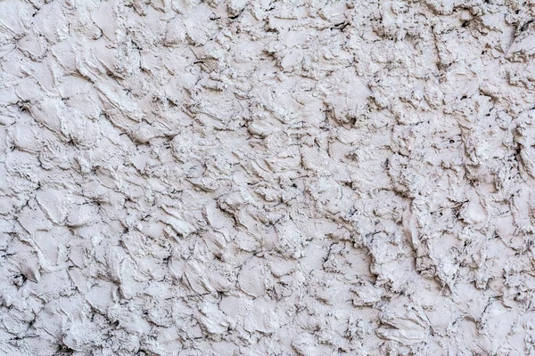 Grå konsistens av en betongvägg, lager av dekorativa gips, abstrakt bakgrund — Stockfoto