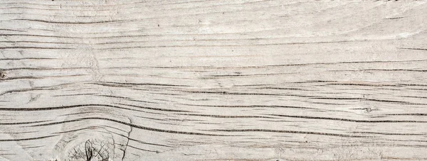 Текстура антикварних підлогових дощок, стара висушена деревина з великою кількістю тріщин і пілінгових волокон, крупним планом абстрактний фон — стокове фото