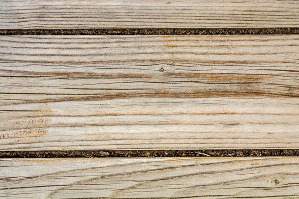 Textura de una antigua pared de madera, madera seca vieja con un montón de grietas y fibras peladas, fondo abstracto de primer plano —  Fotos de Stock