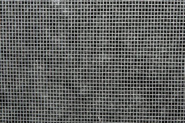 Schützendes Kunststoffnetz mit kleinen Zellen, Nahaufnahme-Abstraktionshintergrund — Stockfoto