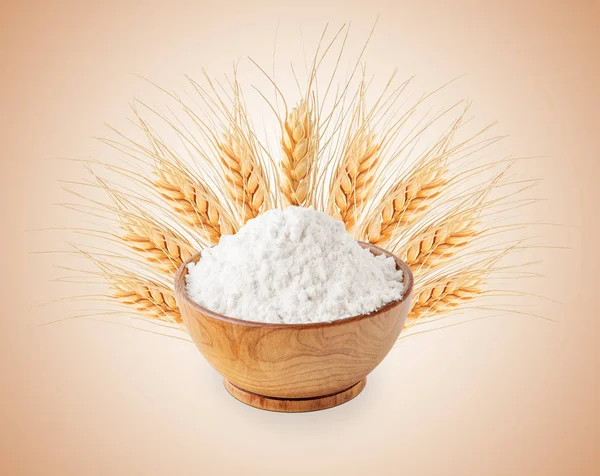 Tigela de farinha de trigo branca e orelhas isoladas — Fotografia de Stock