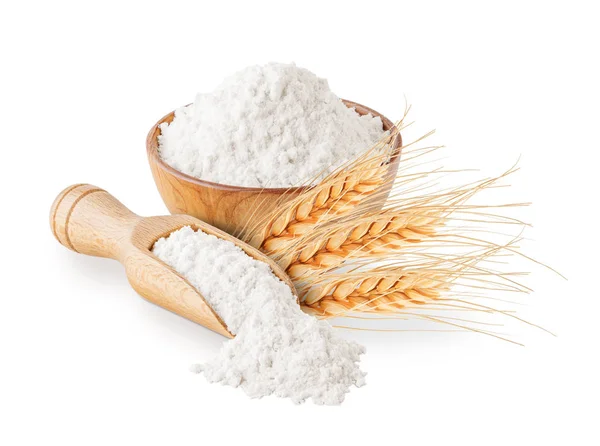 Harina de trigo integral y orejas aislados en blanco Imagen de stock
