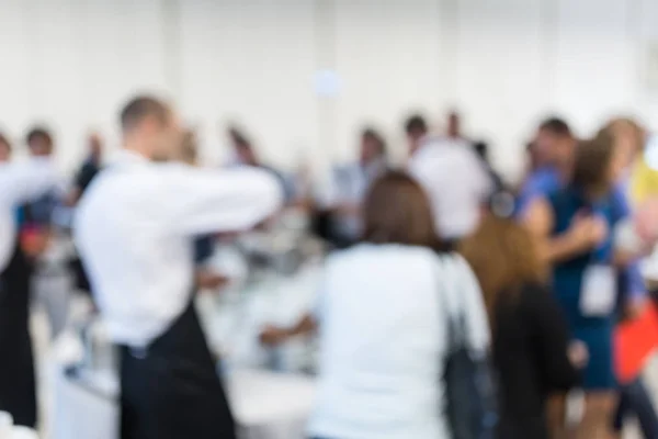 Blured image of businesspeople at coffee break at conference meeting. — Stock Photo, Image